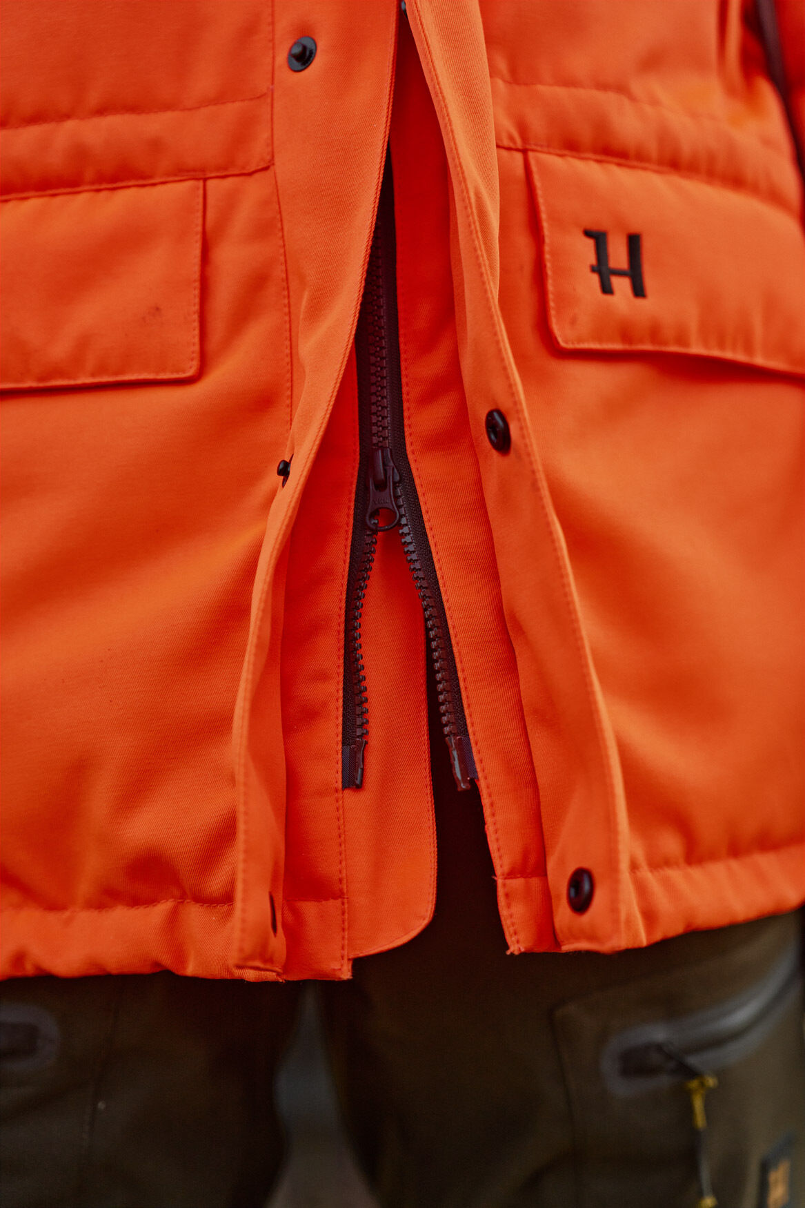 Härkila Wildboar Pro HWS Insulated Jacke (Orange blaze)
