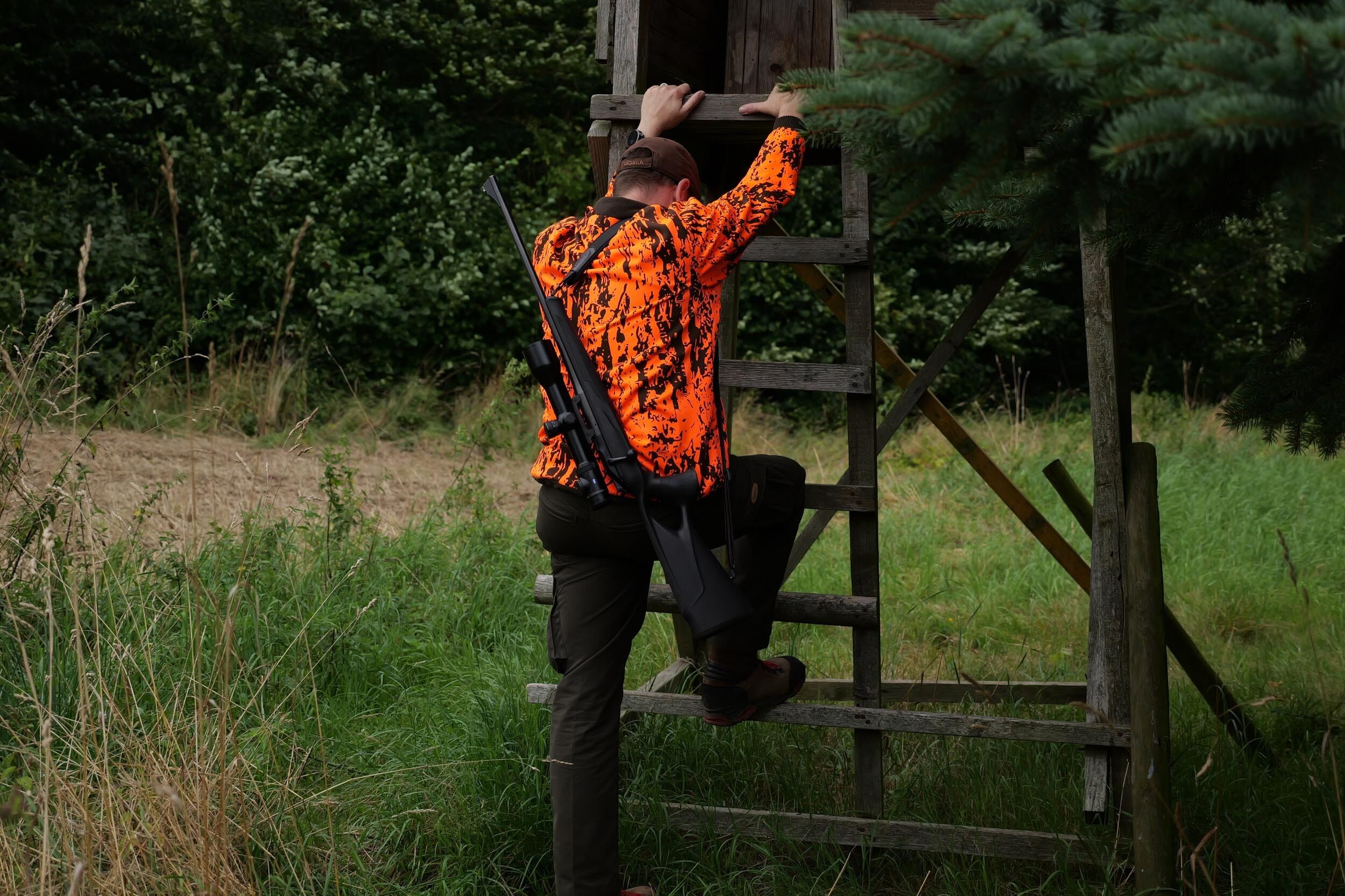 Hubertus Warn-Wendejacke Fleece Drückjagd (orange/oliv)