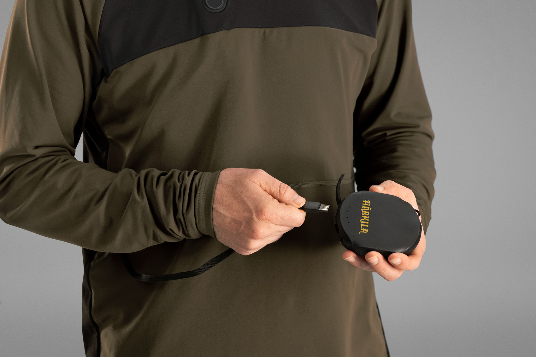Härkila Heat Heiz-Longsleeve USB-C (Willow green/Black)